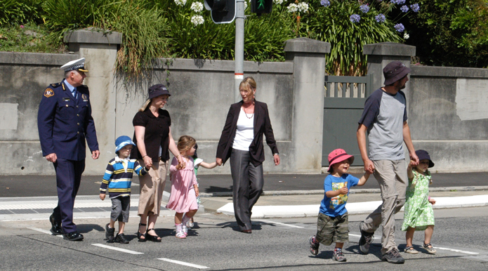 Acting Commissioner of Police, Scott Tilyard and Minister for Police and Emergency Management and Education, Lin Thorp participating in a safe walk to school